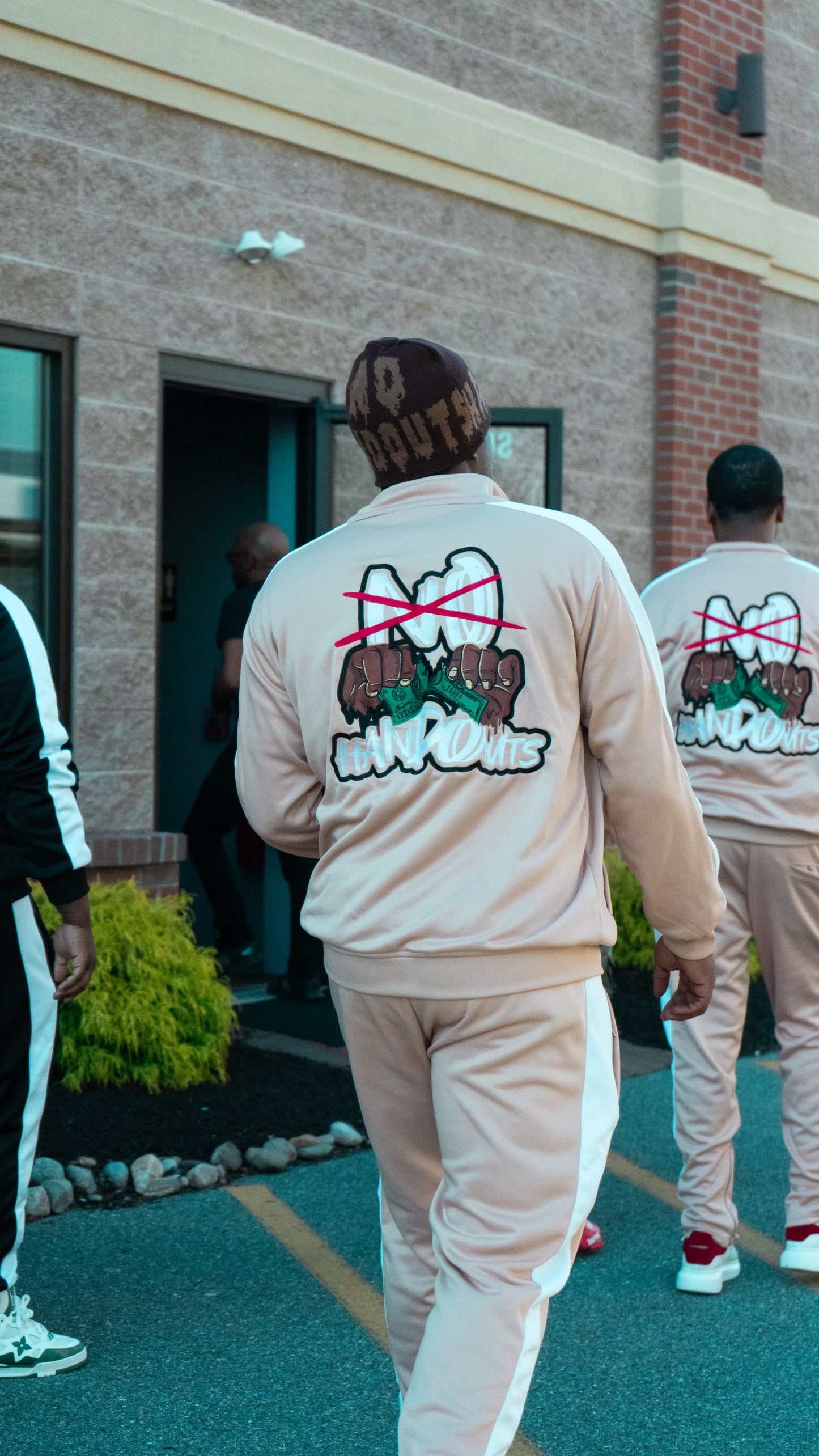 “NoHandOuts” Track Suits