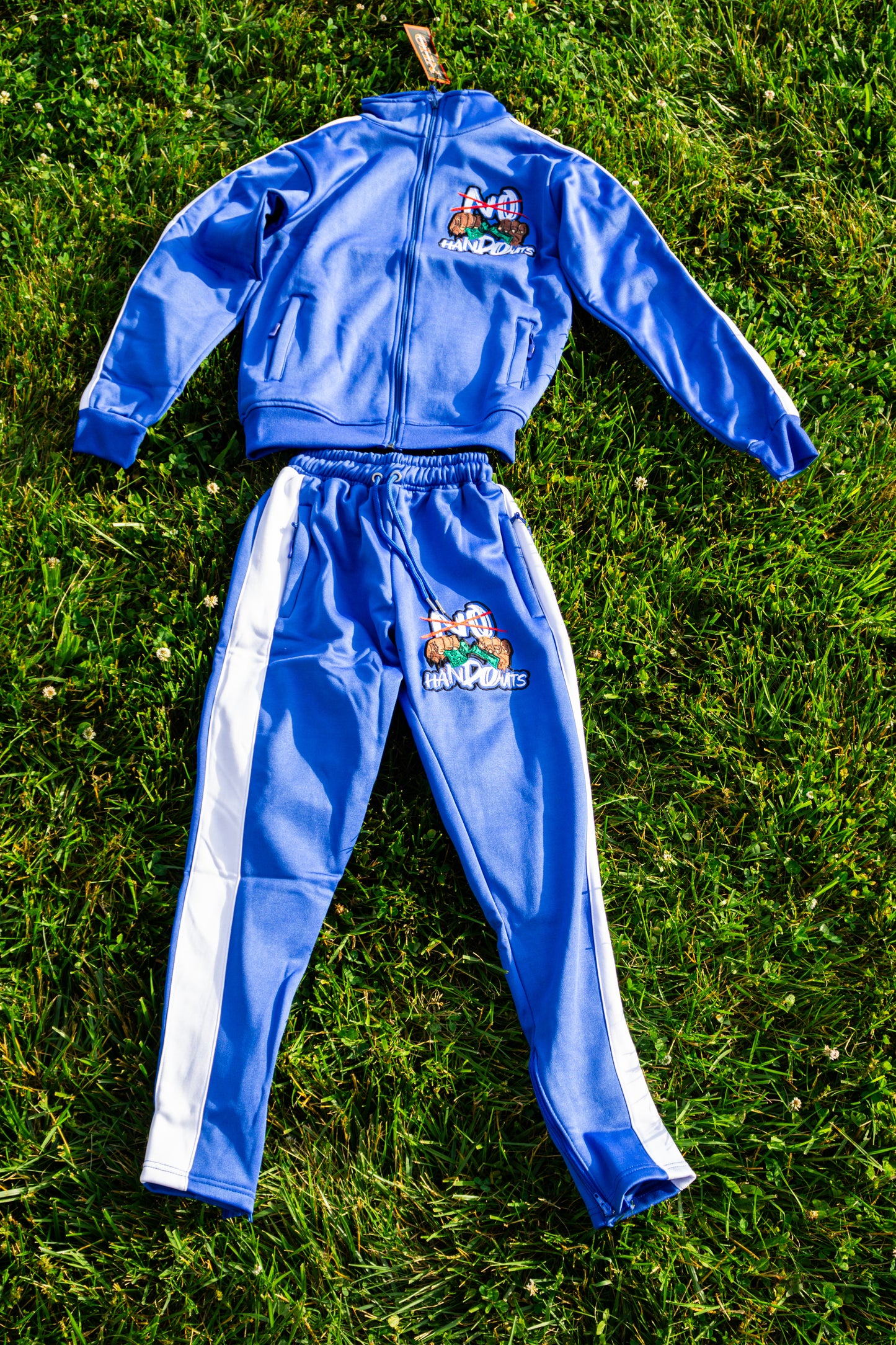 “NoHandOuts” Track Suits